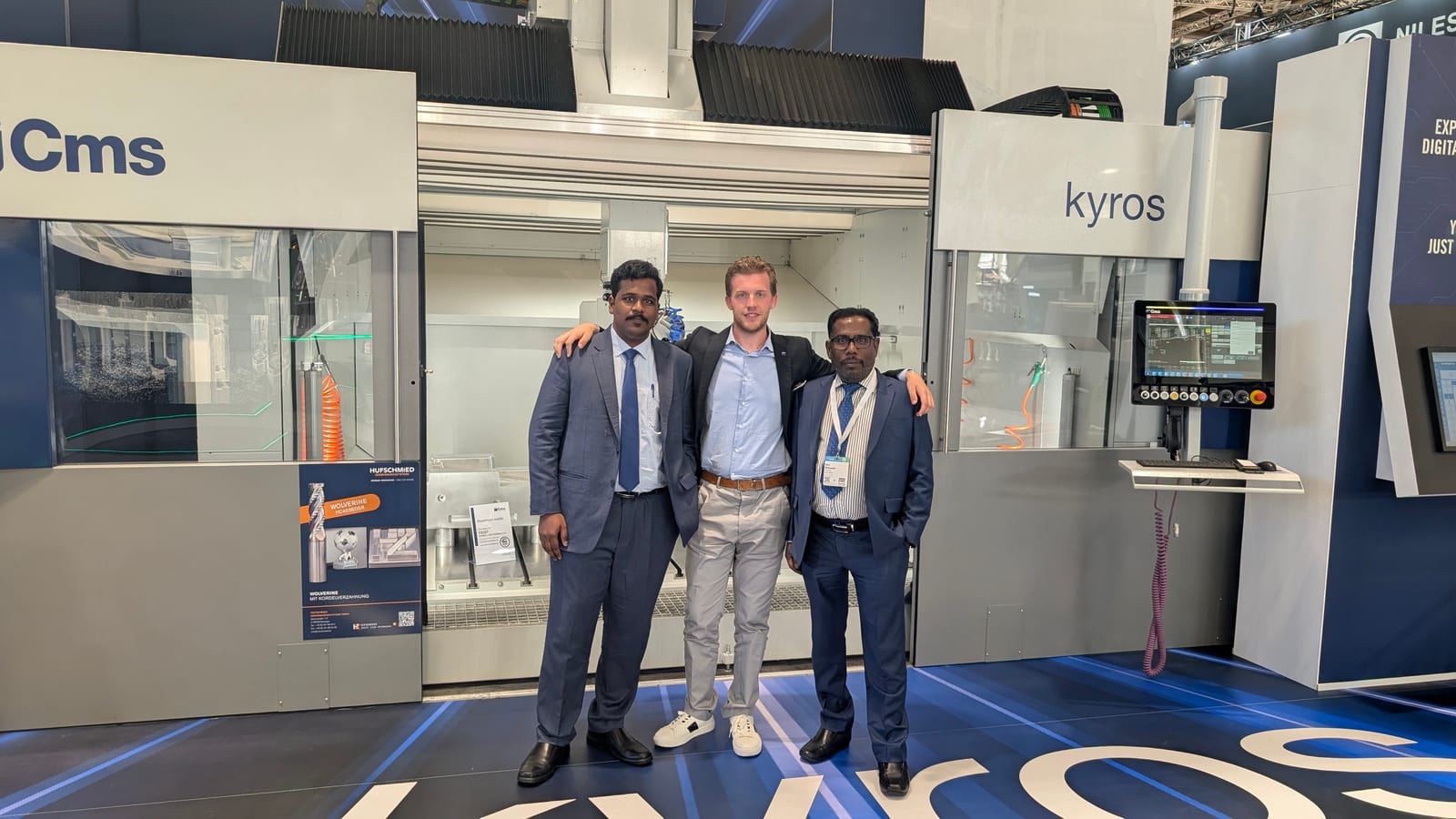 ABS India and CMS team at the CMS stand with a Kyros 5-axis machining center, EMO Hannover 2025